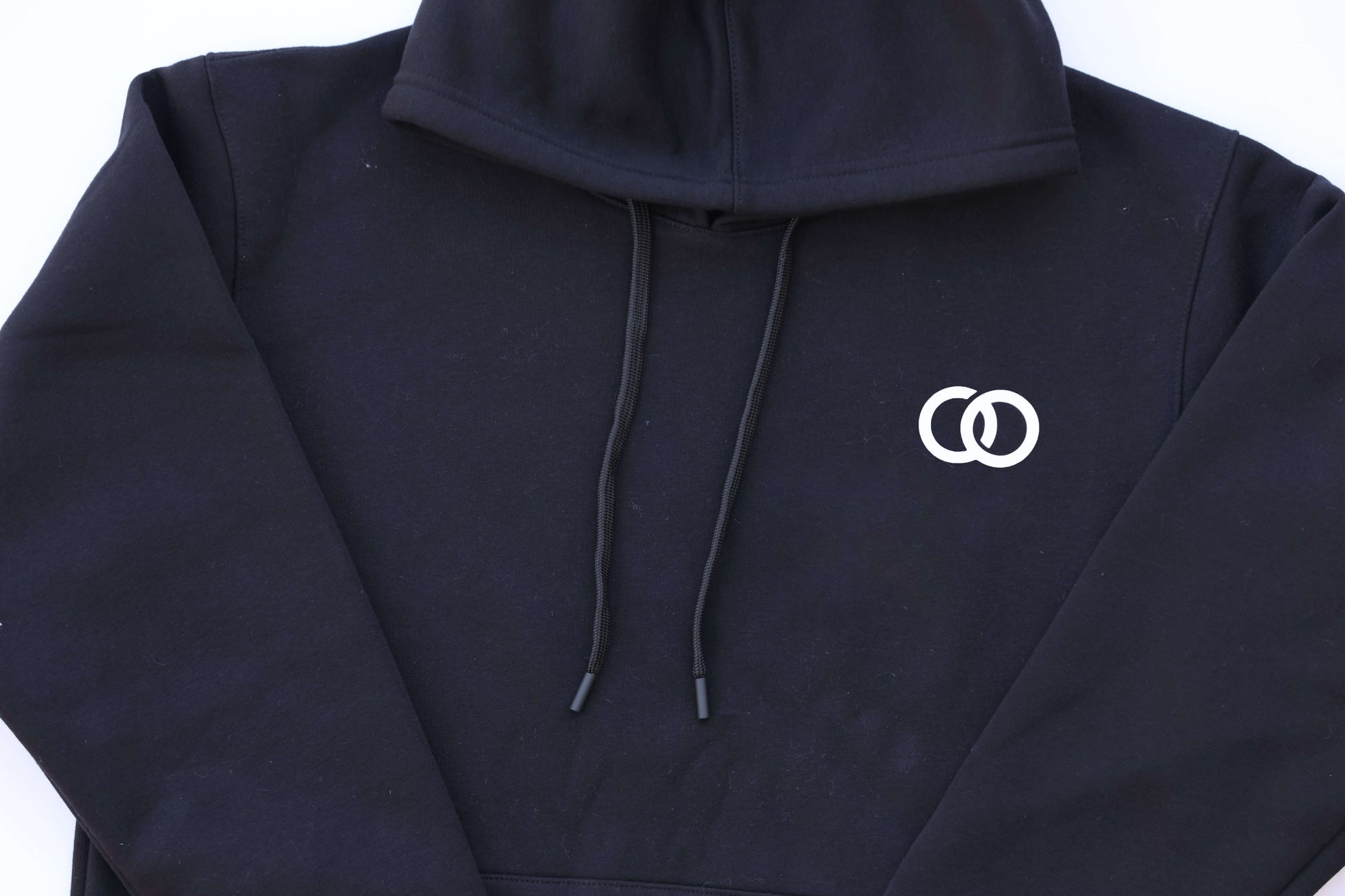 Black DUO Classic Hoodie with minimalist design featuring the Duo logo, perfect for casual wear